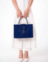 SUEDE STATEMENT HANDBAG